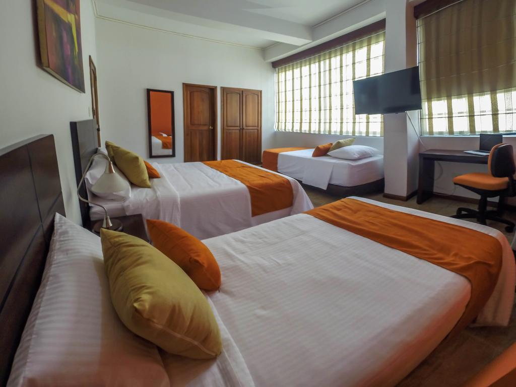 Hotel 721 Pereira Quarto foto